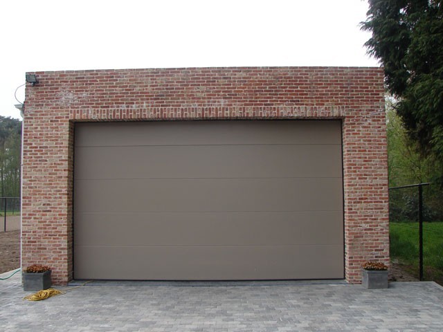 Stem voordeur, ramen en garage op elkaar af | Raemdonck PVC nv: Deuren en Veranda's